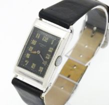 An early automatic gentleman's Autorist watch by John Harwood, the silver case with import marks for