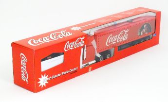 Toy: A Dickie-Spielzeug advertising 2-channel radio controlled Coca Cola Christmas lorry. Boxed. Box