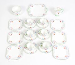 A quantity of Shelley tea wares decorated with flowers to include cups, saucers, plates, cake /