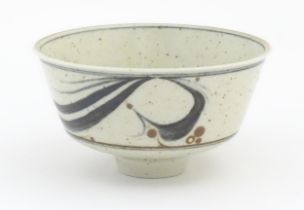 A studio pottery footed bowl with brushwork detail by Derek Clarkson (1928-2013). Makers mark to