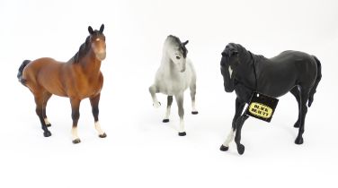 Three Beswick matte models of horses to include Black Beauty no. 2466, a brown swish tail no. 1182