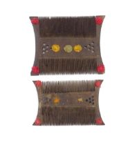 Two wooden shaped and double sided combs with pierced and thread detail. Largest approx. 5 1/2" wide