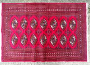 Carpet / Rug : A North East Persian Turkoman rug, the red ground with repeated geometric motifs