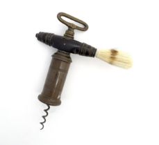 A 19thC double action corkscrew with bronzed barrel and turned hardwood handle with brush. Approx. 7