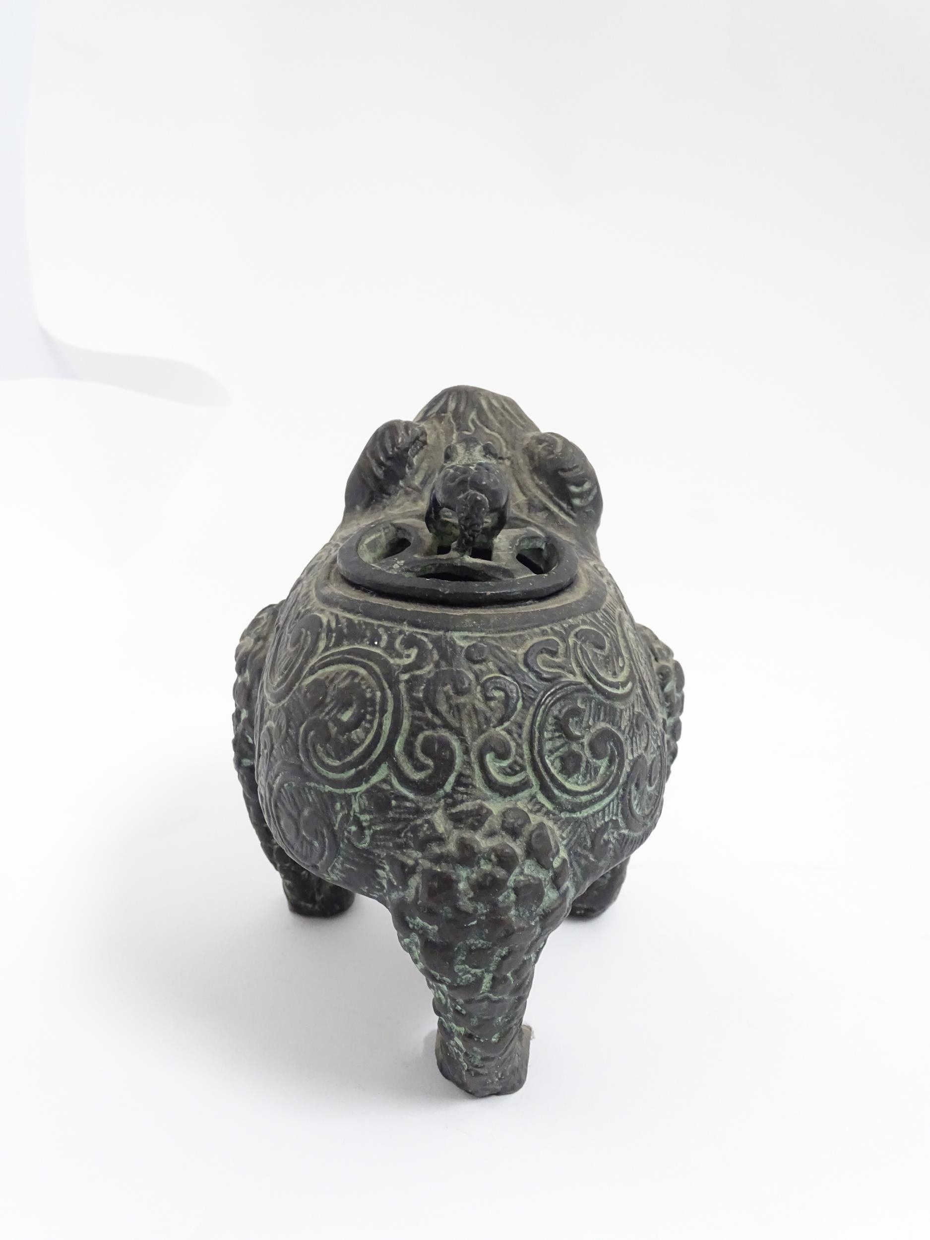 A Chinese cast censer modelled as a three legged toad with scrolling decoration, the pierced lid - Image 4 of 8
