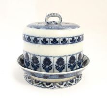A Minton footed dish and cover / cheese dome in the blue and white Aster pattern. Marked under.