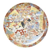 A large Japanese satsuma charger decorated with Samuri warriors in a mountain landscape. Character
