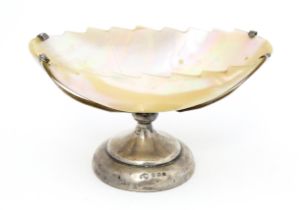 A silver table salt with mother of pearl bowl, hallmarked Birmingham 1908, maker Arthur Joseph