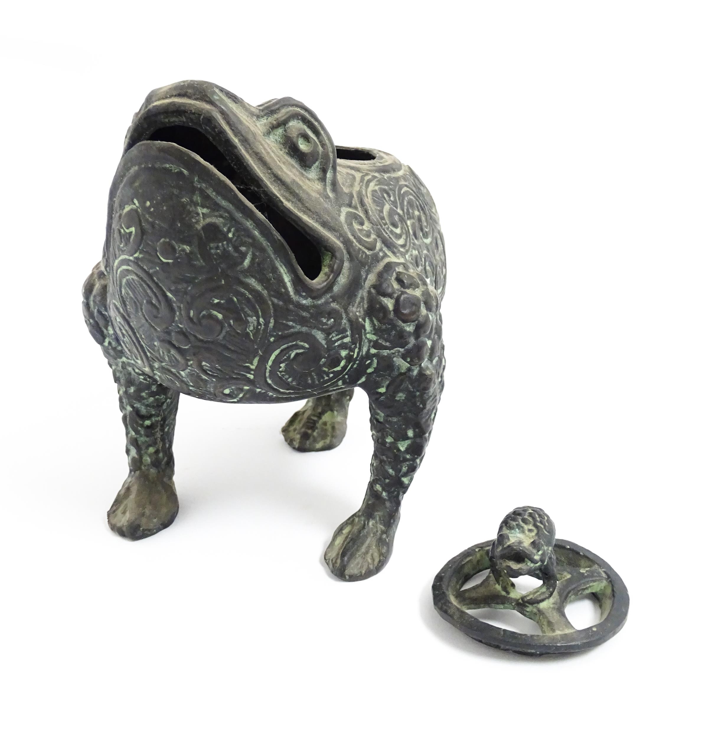 A Chinese cast censer modelled as a three legged toad with scrolling decoration, the pierced lid - Image 6 of 8