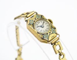 A 9ct gold cased ladies Swiss wristwatch with enamel decoration to case and marked with import marks