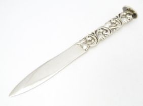 A Norwegian silver letter opener / paper knife with acanthus scroll to handle and seal end, maker