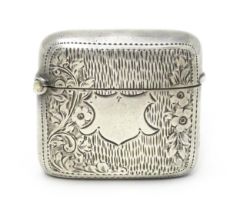 A silver vesta case with engraved decoration hallmarked Birmingham 1903, maker William Henry
