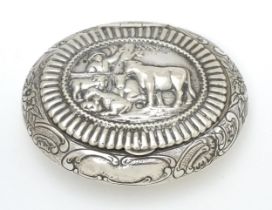 A Dutch silver snuff box / tobacco box of ovoid form, the lid decorated with pastoral scene with