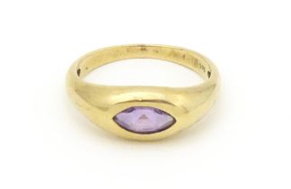 A 9ct gold ring set with central marquise cut amethyst. Ring size approx. N Please Note - we do