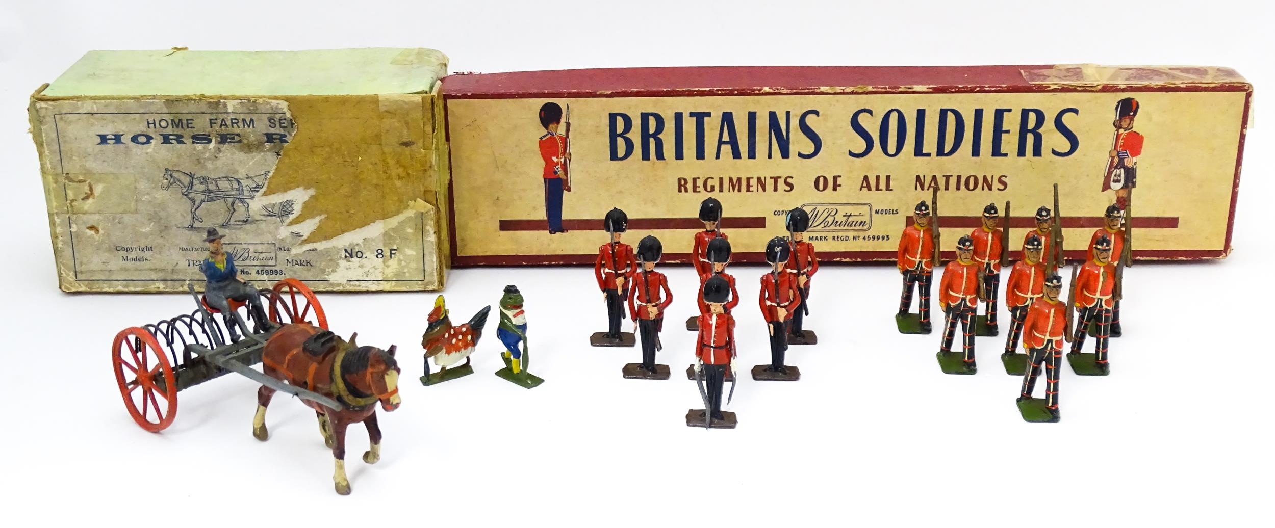 Toys: A quantity of Britains Ltd. cast toys comprising a boxed Horse Rake from the Home Farm Series,
