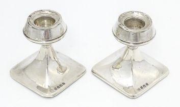 A pair of silver short candlesticks hallmarked Birmingham 1927, William J. Myatt & Co. Approx. 2 3/