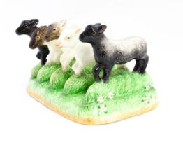 A Border Fine Arts James Herriot Country Kitchen Collection ceramic toast rack modelled as lambs,