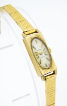 A ladies Waltham wrist watch, the dial signed Waltham, Incabloc, in a 9ct gold case with an 18ct