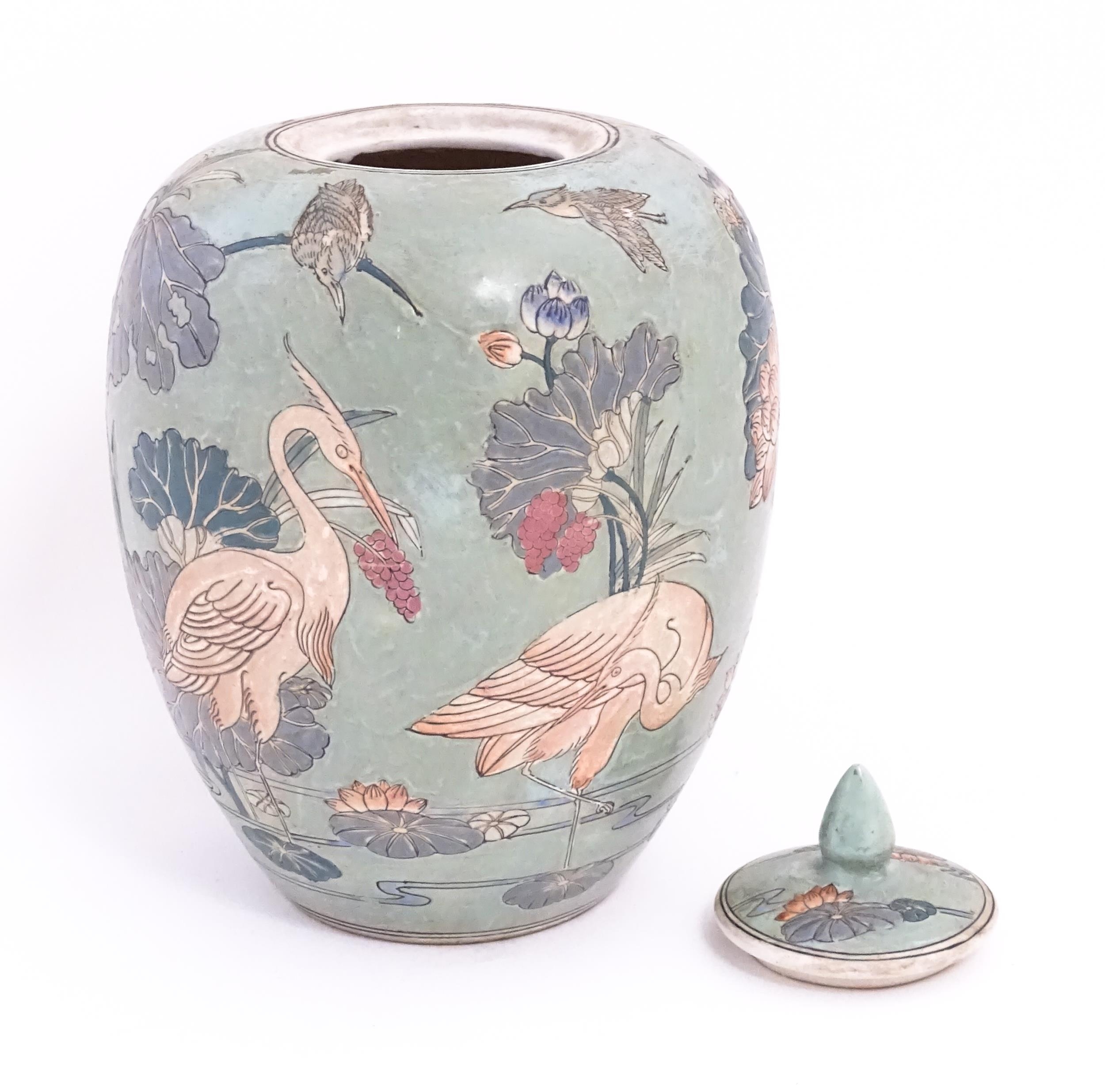 A Chinese ginger jar with celadon style glaze decorated with crane birds, flowers, lily pads, etc. - Image 6 of 8