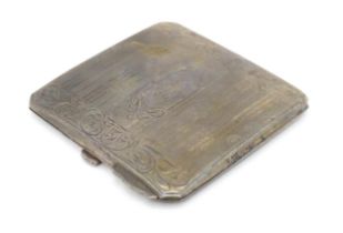 A Canadian silver powder compact with engine turned decoration and engraved acanthus scroll detail