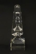 A 19thC cut glass obelisk / prism with urn detail to centre. Approx. 6 3/4" high Please Note - we do