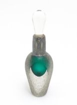 A scent / perfume bottle with green detail and silver overlay decoration to neck by Sileda Ltd.