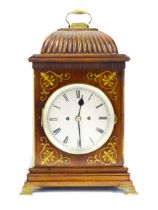 A 19thC 8-day mahogany bracket clock with inlaid brass detail, the movement striking on a gong. Dial