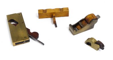 Four miniature woodworking / carpentry plane tools , comprising a Victorian brass chariot plane with