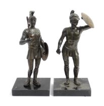 Two 20thC cast sculptures depicting centurion soldiers with helmets and shields. Approx. 7" high (2)