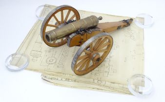 Militaria : a 20thC scratch built model of a desk cannon, based on the 1864 9 pdr howitzer. Together