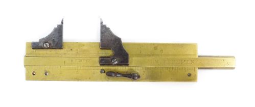 A 20thC brass calliper / gauge, engraved H. W. Freeman. Approx. 5" long overall Please Note - we