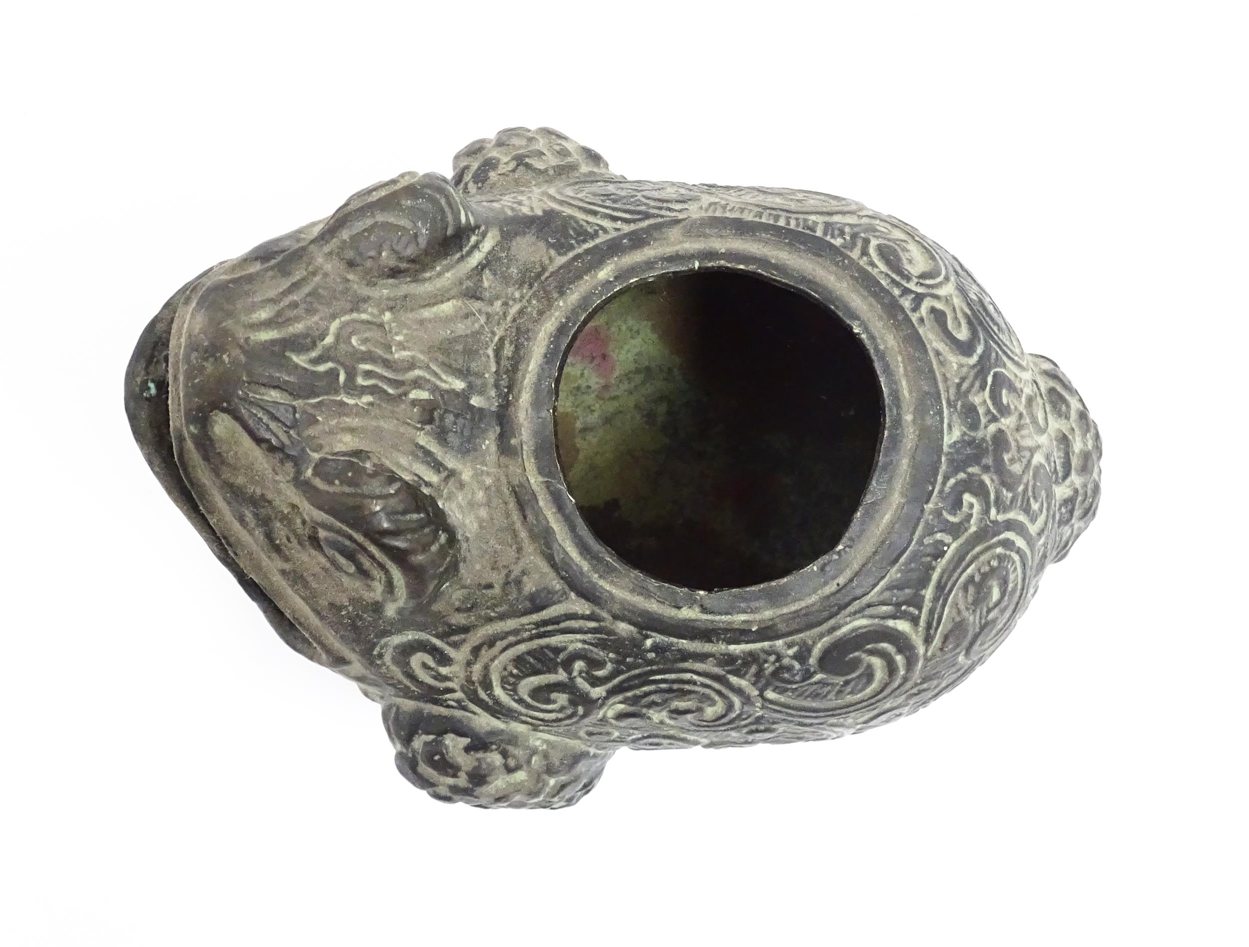 A Chinese cast censer modelled as a three legged toad with scrolling decoration, the pierced lid - Image 2 of 8