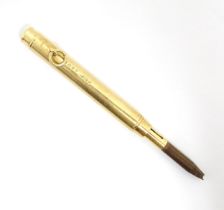 An 18ct gold retractable pencil, hallmarked London 1926, maker Sampson Mordan & Co. Approx. 2 3/4"