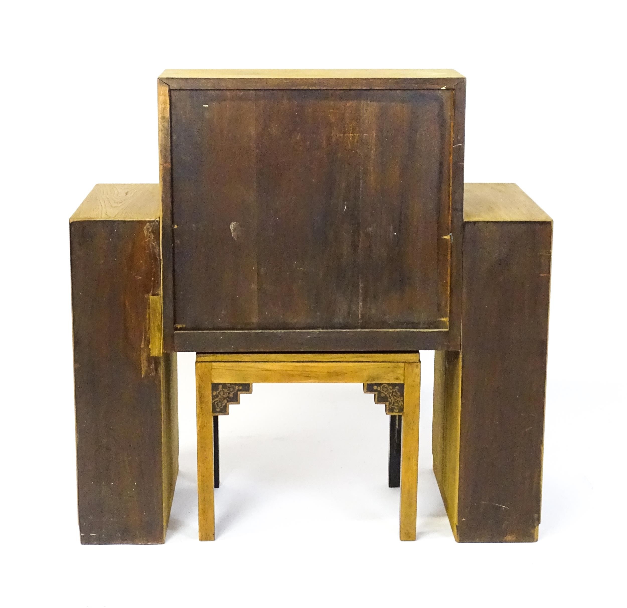 An early / mid 20thC Teak bureau accompanied by a stool, with carved oriental scenes to the front, - Image 12 of 12