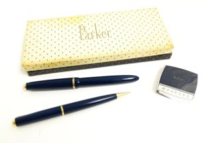 A boxed mid 20thC Parker Slimfold fountain pen with 14K gold nib and Parker No. 3 propelling