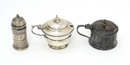 A silver mustard pot hallmarked Birmingham 1926, maker Mappin & Webb Ltd. Together with another