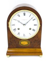 A late 20thC 8-day mantel clock. The dial signed Comitti. The 8-day movement striking on a bell.