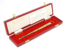 A cased silver meat skewer hallmarked Sheffield 1977, maker Cooper Brothers & Sons Ltd. Skewer