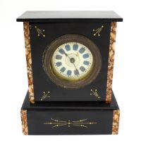 A slate cased mantle clock with rouge marble style detail and having a German movement. Approx 9"