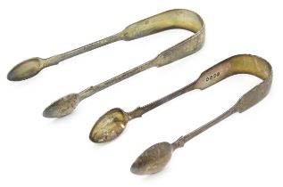 Two Victorian Fiddle pattern sugar tongs one hallmarked Exeter 1863, maker Philip Osment, the