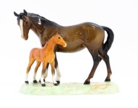 A Beswick horse group depicting Mare and Foal, model no. 953. Approx. 7 1/4" high Please Note - we