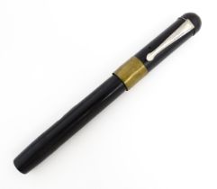 A 20thC Mont Blanc Simplo fountain pen, with 18ct gold nib, the barrel marked '25', approx 5 3/8"