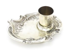 A German .800 silver spill holder on shaped stand with floral and scroll detail, maker Wilhelm