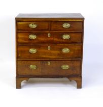 Early 19thC mahogany chest of drawers with two short over three long drawers with brass backplates