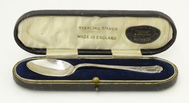 A cased silver spoon hallmarked Birmingham 1912, maker Charles Wilks. Spoon approx. 5 1/4" long