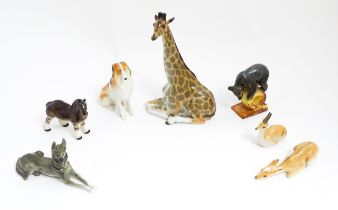 A quantity of assorted Russian ceramic models of animals to include giraffe, horse, bear, deer, dog,