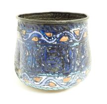 An Islamic copper planter with banded enamel decoration. Approx. 7 1/2" high Please Note - we do not