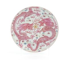 A Chinese famille rose dragon dish with two dragons, flaming pearl and stylised clouds. The