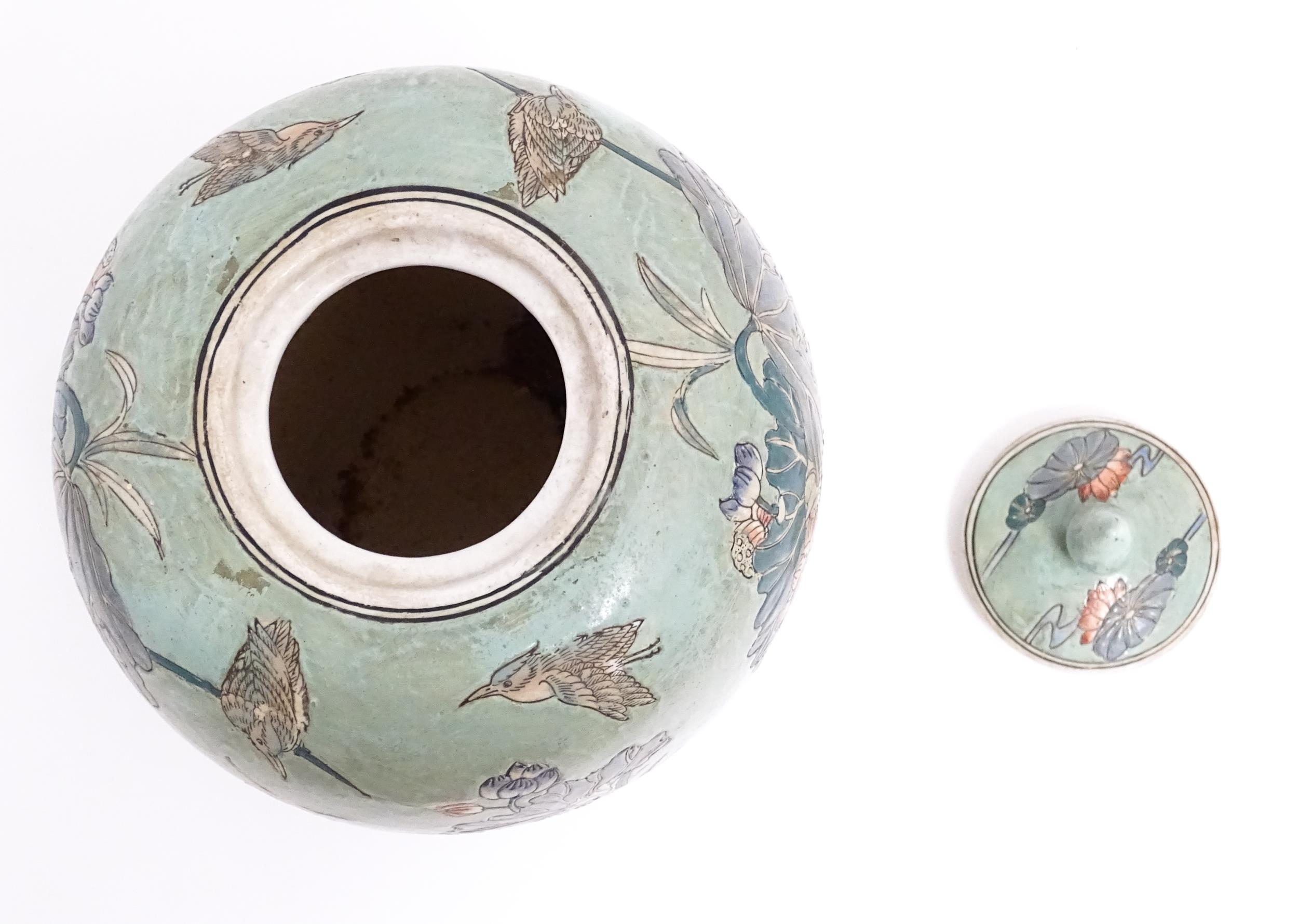 A Chinese ginger jar with celadon style glaze decorated with crane birds, flowers, lily pads, etc. - Image 7 of 8