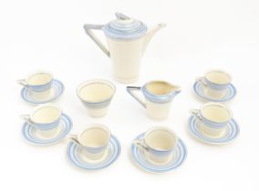 An Art Deco Solian Ware coffee wares to include coffee pot, sugar bowl, milk jug, cups and